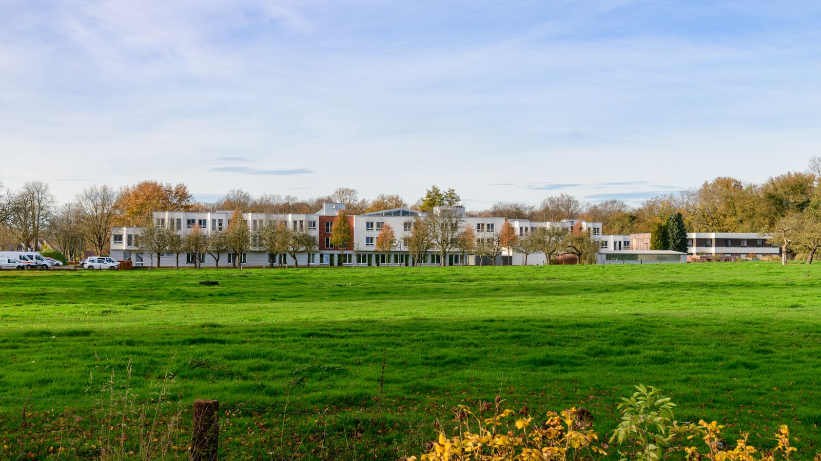 Modern residential care buildings in landscaped grounds