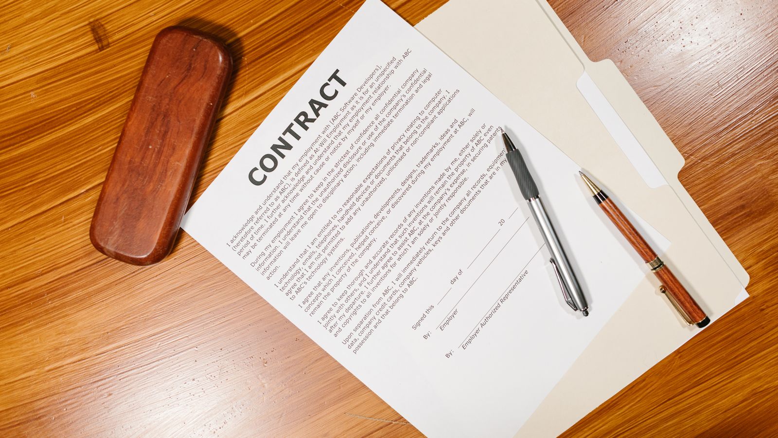 Contract documents on a desk